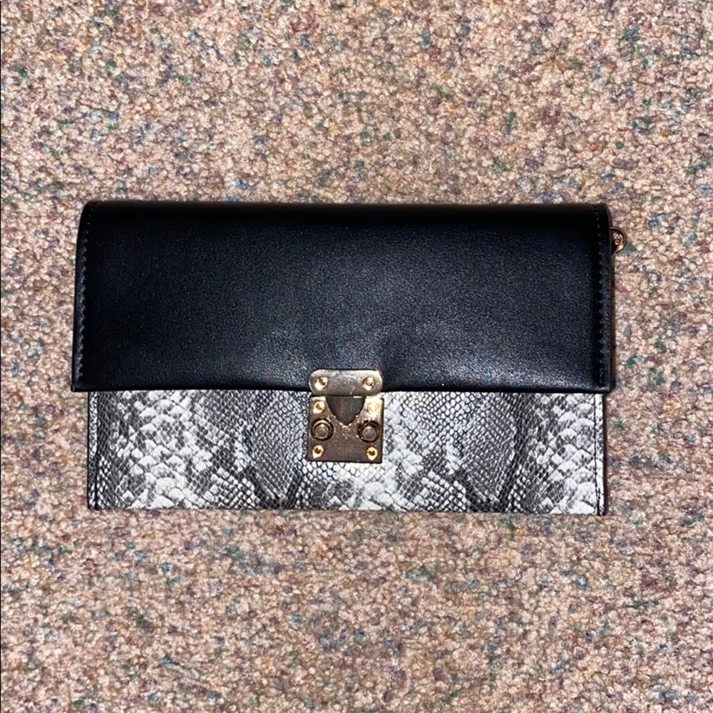 Black and snake skin purse